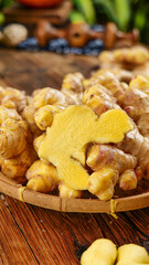 Freshly Dug Small Yellow Ginger Roots from Yunnan Alpine Region in Traditional Bamboo Basket