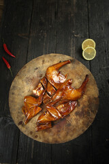 Guangxi Preserved Air-Dried Duck Traditional Chinese Cuisine on Rustic Wooden Board