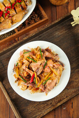 Hand-torn Air-dried Chicken Specialty - Traditional Chinese Hubei Cuisine on Rustic Wooden Background