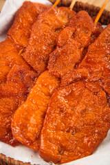 Grilled Marinated Pork Tenderloin Skewers with Caramelized Glaze in Bamboo Basket