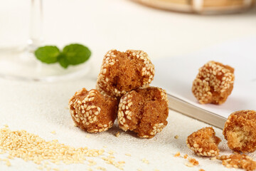 Traditional Guangxi Sesame Balls Chinese Crispy Pastries with Seeds on Marble Surface