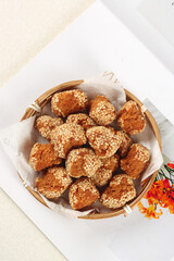 Guangxi Sesame Seed Balls - Traditional Chinese Crispy Fried Snacks in Bamboo Basket