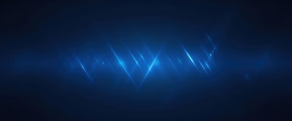 Obraz premium A dark blue background with a pattern of light rays.
