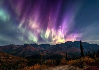 Majestic Aurora Borealis over Mountains © Lauren