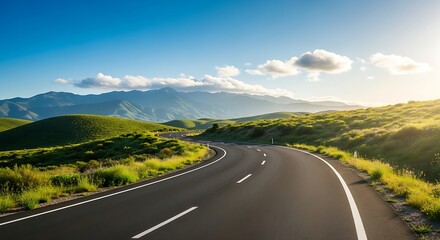 Scenic Winding Road Through Lush Green Mountains.