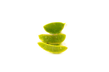 Three green, fresh aloe vera slices are stacked on a clean white background.
