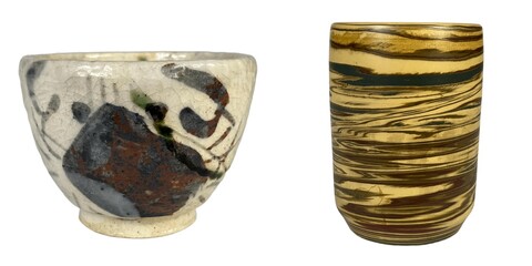 Neutral background still life artistic ceramic bowls and vases in contemporary display