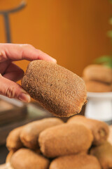 Fresh Kiwifruit Selection at Guizhou Market Shelf - Hand Picking Healthy Organic Tropical Fruit for Gift Set