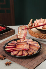 Woodfired Smoked Bacon Slices in Traditional Asian Style Display with Chopsticks and Spices