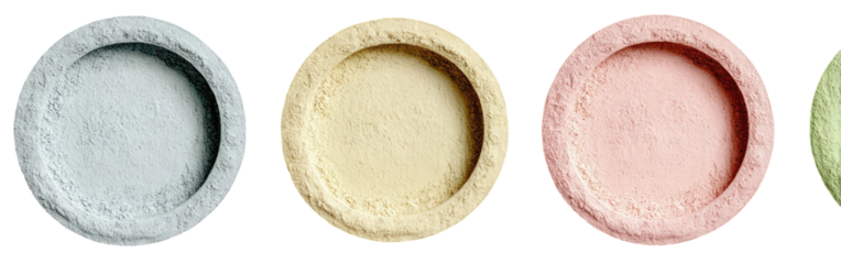 Four circular, textured discs in light gray, beige, rose, and sage green