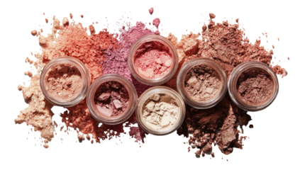 Assorted eyeshadow palettes scattered on dark background