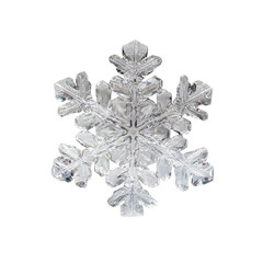 Close-up of intricate, symmetrical snowflake