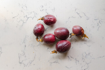 delicious and juicy exotic fruit - passion fruit on a kitchen counter, natural light