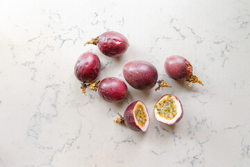 delicious and juicy exotic fruit - passion fruit on a kitchen counter, natural light