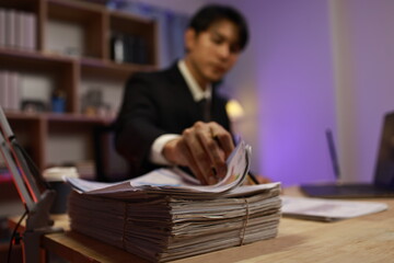 Abstract grunge background with rough textured canvas, faded colors, dark tones, scratches, and distressed effects creating moody artistic atmosphere.
