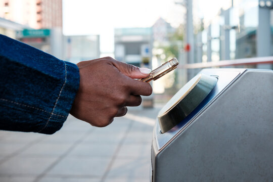 Commuter using smartphone to pay public transport fare