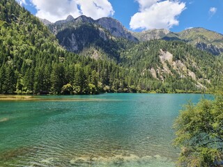 Reflection on the surface of a lake in summer in Jiuzhaigou National Park, China.