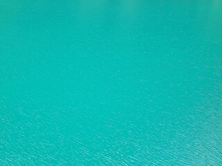 Image of turquoise water surface.