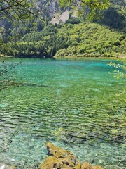 Reflection on the surface of a lake in summer in Jiuzhaigou National Park, China.