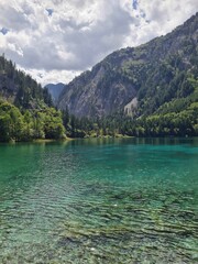Reflection on the surface of a lake in summer in Jiuzhaigou National Park, China.