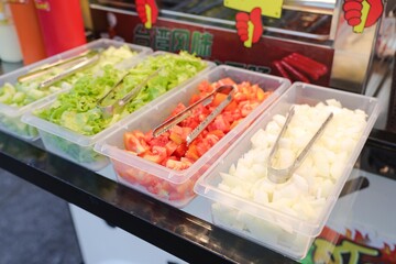 Freshly Prepared Culinary Array: A vivid depiction of various, brightly hued, fresh ingredients, showcasing culinary preparation and food diversity.