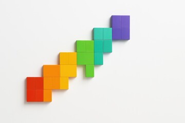Fototapeta premium Colorful Arrangement of Geometric Shapes in a Gradient Pattern on a Clean White Surface for Creative and Educational Uses