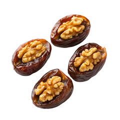 Obraz premium Four pitted dates stuffed with walnut halves on a black background dried fruit