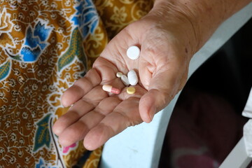 The Hope in a Palm, A Glimpse of Healing Held by a Hand That Has Known the Weight of Time.