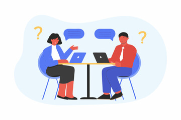 Two people at a table with laptops and question marks discussing ideas and communication