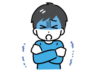 青ざめた顔で震えている私服の若い男性(上半身・正面)