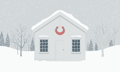Naklejka premium Cozy SnowCovered House with Festive Wreath in Winter Landscape.