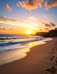 Obraz premium Golden sunset over a tranquil beach