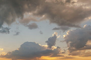 Dramatic sunset sky with golden clouds