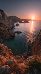 Beautiful sunset over the rocky coastline of a mediterranean island with warm light reflecting on the water surface