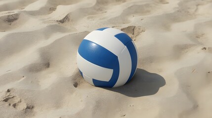 Obraz premium A blue and white volleyball rests on the sandy beach, ready for a game