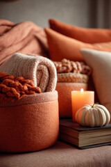 Cozy autumn still life with a candle and pumpkin