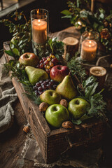 Autumnal fruit arrangement with candles