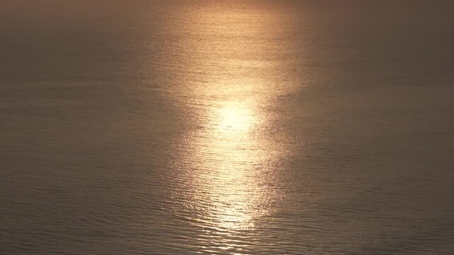 HD ground-level footage of a spectacular sunset over the Pacific Ocean.