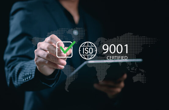 ISO 9001 Standard certification standardisation quality control concept, businessman choose ISO 9001 icons for certified and quality management of organizations.