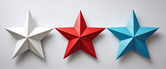 Three colorful stars arranged horizontally on a light gray background