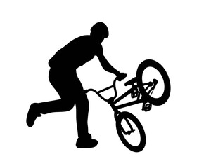 Fototapeta premium silhouette of a man riding a bmx bike