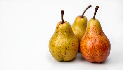 Three pears of varying shades of green with some spots of brown. The pears are arranged side by side against a neutral background, creating a sense of symmetry.