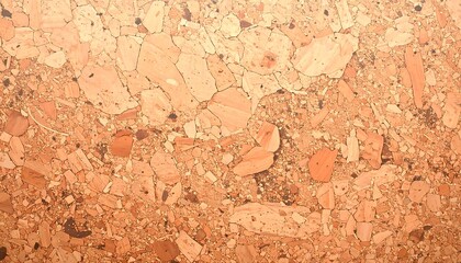 Close-up view of a light orange stone surface with irregular patterns