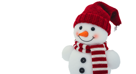Close up of a smiling snowman wearing a red knitted hat and striped scarf against a black background