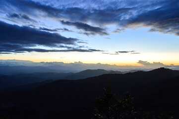 Landscape Sunset in Twilight time Over the Mountains in the Evening  at Doi Suthep-Pui National Park,Chiang mai, Northern Thailand.