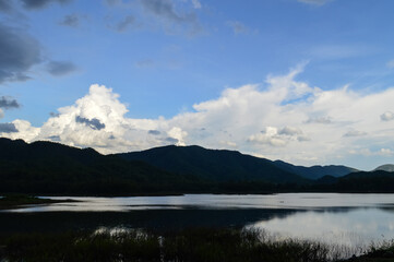 mountains and Sky in the evening before sunset on the lake.