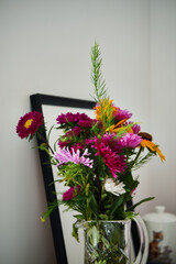 astry ,kwiaty,wazon,bukiet kwiatów 