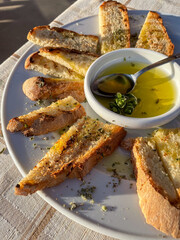 Bruschetta, toasted bread with olive oil, garlic and oregano. Italian simple cuisine