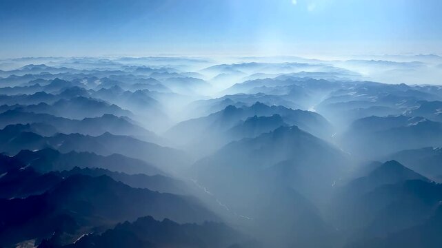 Flying over the Himalaya Mountains at dawn