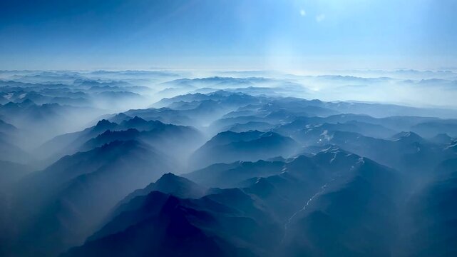 Flying over the Himalaya Mountains at dawn